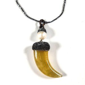 Large Fang Shaped Pendant on Sparkling Necklace. This one really grabs attention